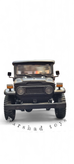 ماکت ماشین فلزی تویوتا لندکروزر FJ40 برند Motor Max رنگ مشکی با سقف سفید در فرشاد تویز