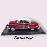 ماکت Chevrolet Bel Air 1950 نمای جانبی رنگ زرشکی با سقف سفید برند Motor Max مقیاس 1:18