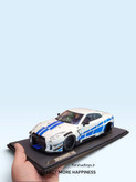 نمای سه رخ جلوی ماکت نیسان GT-R R35 سفید با کیت بدنه LBWK
